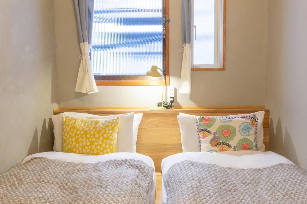 chambres à Hikari Guest House